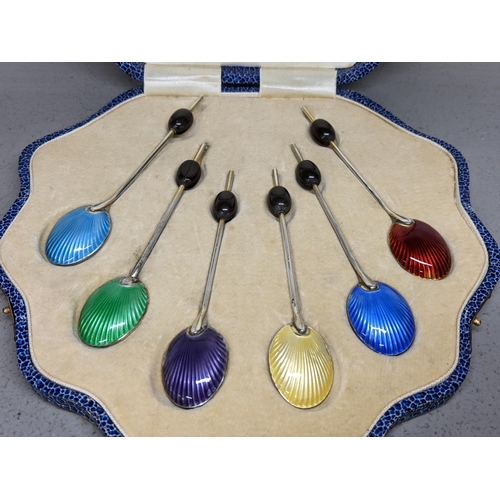 86 - A set of six silver coffee spoons with bean terminals and enamelled bowls A/F
Location: 7.5