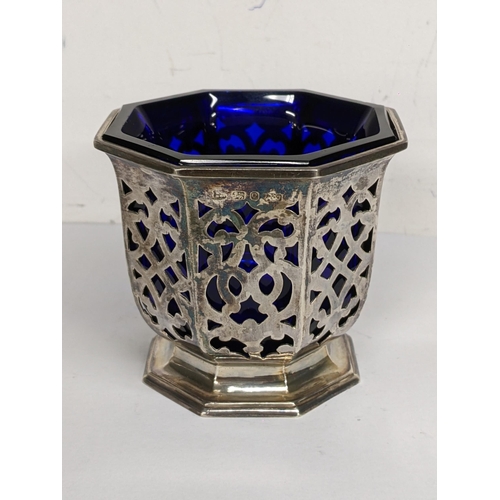 93 - A Victorian silver pierced salt pot of octagonal form, 92.6g excluding glass liner
Location: 5.1