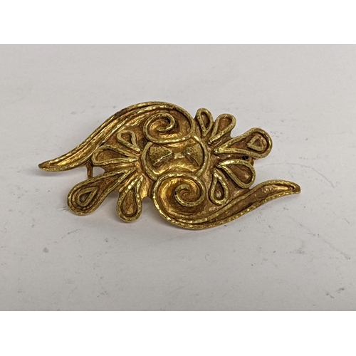 97 - A Greek gold asymmetrical brooch with scrolls, tested as 18ct, 11.7g
Location: CAB3