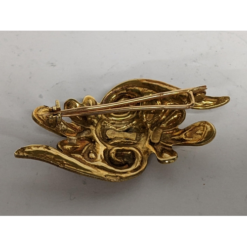 97 - A Greek gold asymmetrical brooch with scrolls, tested as 18ct, 11.7g
Location: CAB3