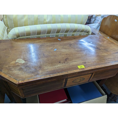 200 - A late Georgian mahogany and boxwood octagonal topped fold over tea table, 74cm h x 95.5cm w
Locatio... 