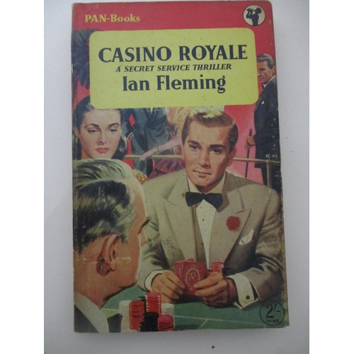 166 - A quantity of books to include seven Ian Fleming's 007 James Bond 1st and early edition paperbacks t... 