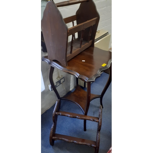 304 - An early 20th century two-tier mahogany occasional table, together with a magazine rack, two chairs,... 