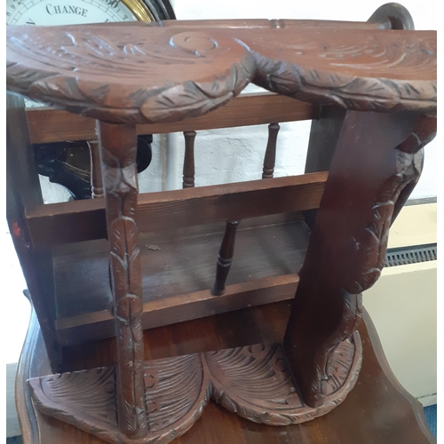 304 - An early 20th century two-tier mahogany occasional table, together with a magazine rack, two chairs,... 