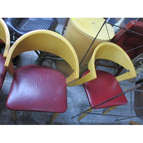 345 - A set of four beech framed chairs with curved backs and splayed legs
Location:G