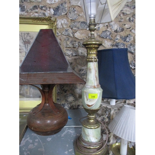 346 - A group of standard lamps and table lamps to include a white painted wrought iron tripod standard la... 