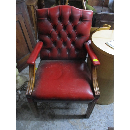 347 - A reproduction red leather button back open arm desk chair Location:G