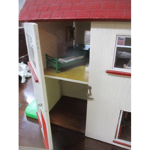 348 - A mid-century painted plywood doll's house, partially furnished, £2.50 pcm to rent Location:G