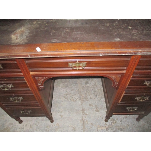 353 - Victorian mahogany kneehole writing desk, the top with mirrored back, below a galleried shelf flanke... 