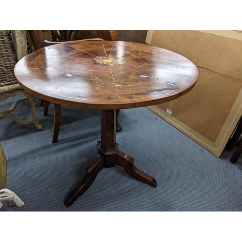 338 - A 19th century mixed veneer tilt-top occasional table having a marquetry top with string inlaid and ... 