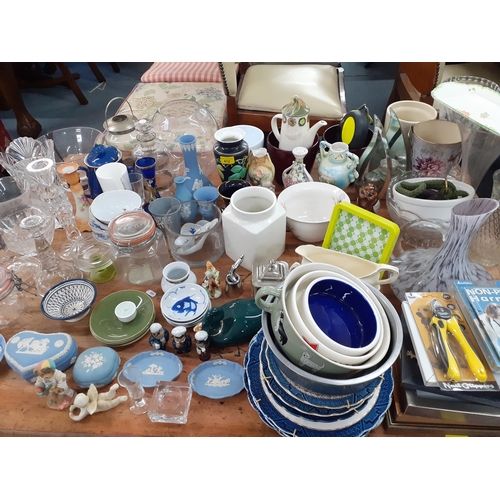 412 - A large mixed household lot to include Wedgwood blue Jasperware, a blue Denby teapot, glassware to i... 