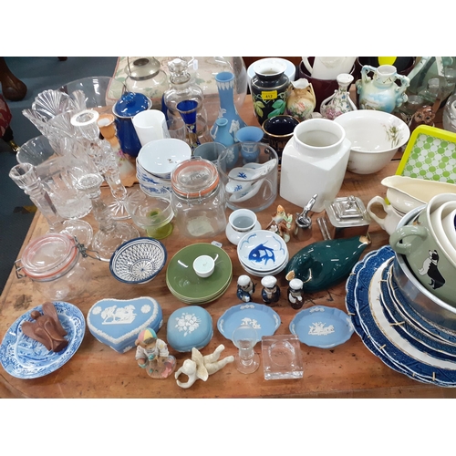 412 - A large mixed household lot to include Wedgwood blue Jasperware, a blue Denby teapot, glassware to i... 