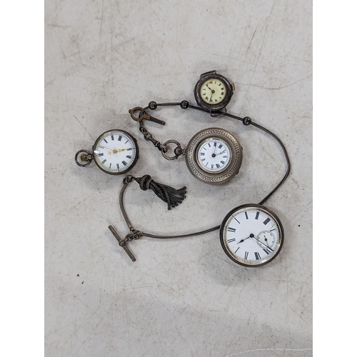 424 - A group of three silver cased watches to include a Victorian fob watch having gilt decoration to dia... 