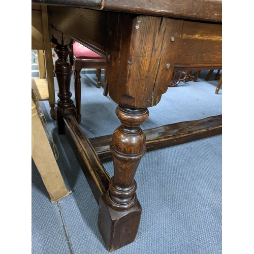 276 - An early 20th century oak refectory table on turned block legs, 76cm H x 99.5cm D x 212.5cm W Locati... 