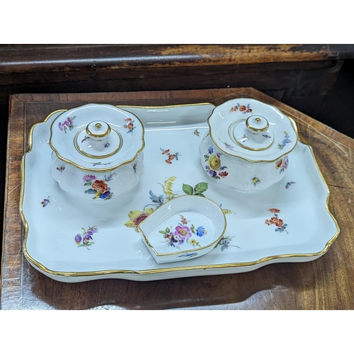 219 - A late 19th/early 20th century Meissen porcelain hand painted desk ink well set
Location:2.2