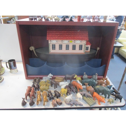 434 - A 20th century Noah's ark with painted animals cased in a wooden box with sliding door
Location:A3M