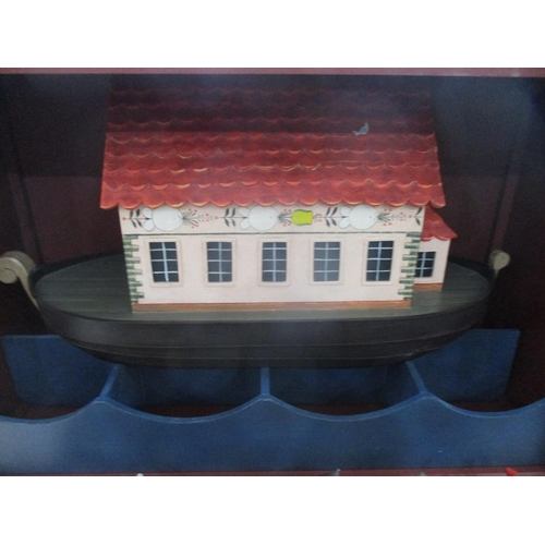 434 - A 20th century Noah's ark with painted animals cased in a wooden box with sliding door
Location:A3M