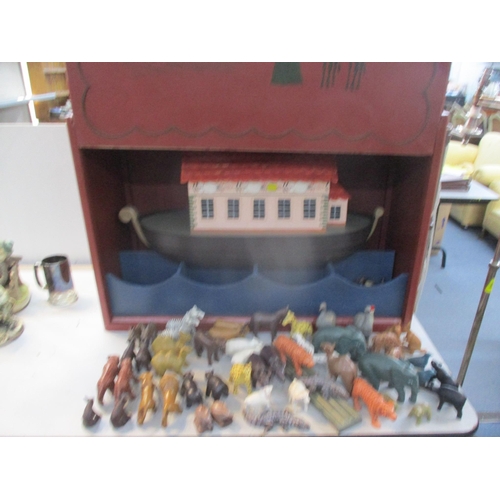 434 - A 20th century Noah's ark with painted animals cased in a wooden box with sliding door
Location:A3M