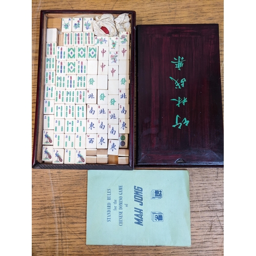 63 - A Mahjong set with counters in a wood case
Location: RWM