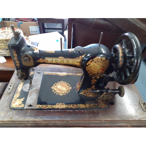 162 - Mixed items to include a vintage Jones sewing machine, a metal jug, silver plated items and a small ... 