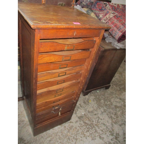 100 - An early 20th century tambour fronted oak filing cabinet of nine drawers 109cm x 48.5cm x 43cm Locat... 