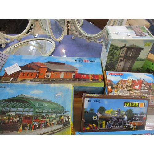 212 - A group of German HO model railway kits to include a Kibri model shed B-9462, Train Shed B-9522, and... 