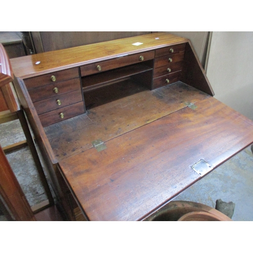 215 - Late Victorian/Edwardian mahogany bureau, fall flap revealing a drawer with filled interior, over on... 