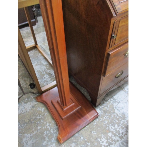 216 - A late 20th century walnut finished lectern, 115cm high Location:G