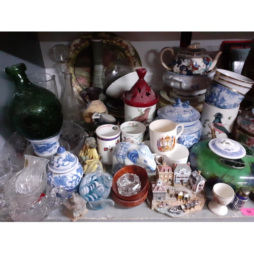 56 - A large miscellaneous lot to include a blue and white ginger jar A/F, vintage cameras and mixed cera... 