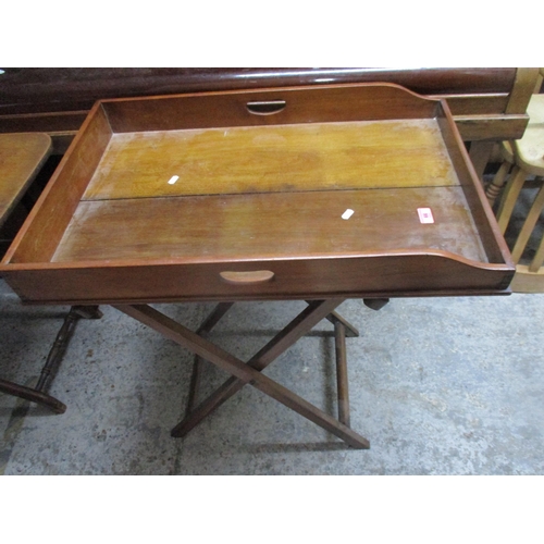 66 - An early 20th century mahogany butlers tray on folding stand
Location:SR