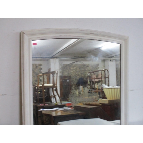 72 - A large white painted wooden framed wall mirror with slightly arched top, rectangular plate glass 18... 