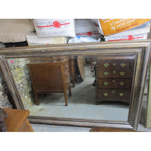 73 - A rectangular wall mirror, silver coloured wooden frame, and bevelled glass plate 107.5cm x 155cm Lo... 
