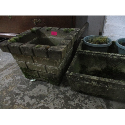 80 - A group of weathered garden concrete planters and a bird bath on tapering column and square base, to... 