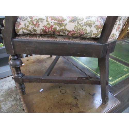 83 - A stained beech and other wood framed open armchair with upholstered seat and back, and loose cushio... 
