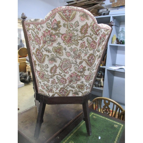 83 - A stained beech and other wood framed open armchair with upholstered seat and back, and loose cushio... 