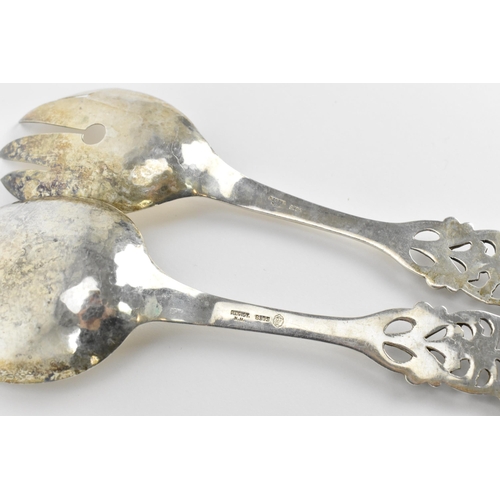 11 - A pair of Norwegian dragestil silver salad servers by Magnus Aase, circa 1930s, with hammered bowls,... 