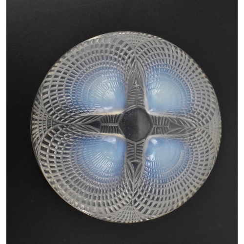 12 - A Lalique 'Coquille' pattern iridescent bowl, of circular form with four relief shells, the undersid... 