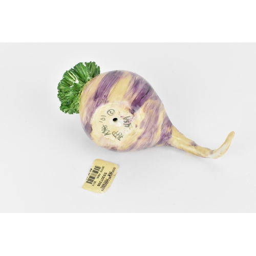 16 - Katherine Houston (contemporary) American, a ceramic model of a turnip, realistically rendered, the ... 