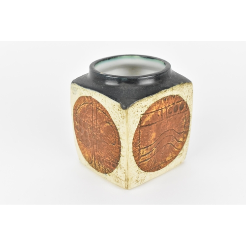 19 - A Troika pottery cube vase, designed by Linda Taylor, each textured side incised with geometric shap... 