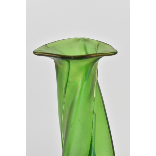 21 - An Art Nouveau kralik style iridescent green vase, of twisted triform with applied drop trails, with... 