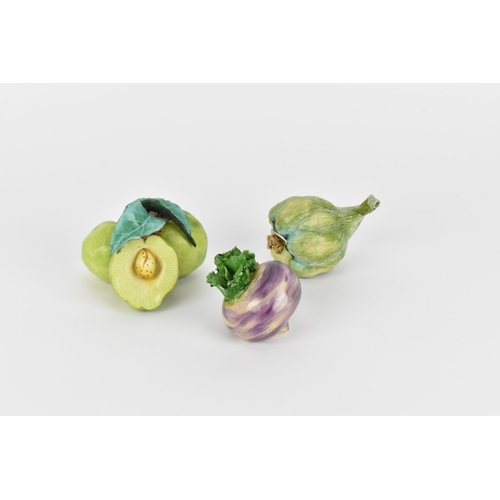 26 - Katherine Houston (contemporary) American, a small collection of ceramic vegetables and fruit, compr... 