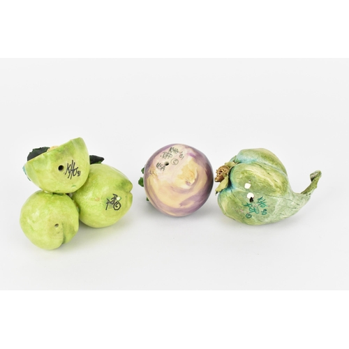 26 - Katherine Houston (contemporary) American, a small collection of ceramic vegetables and fruit, compr... 