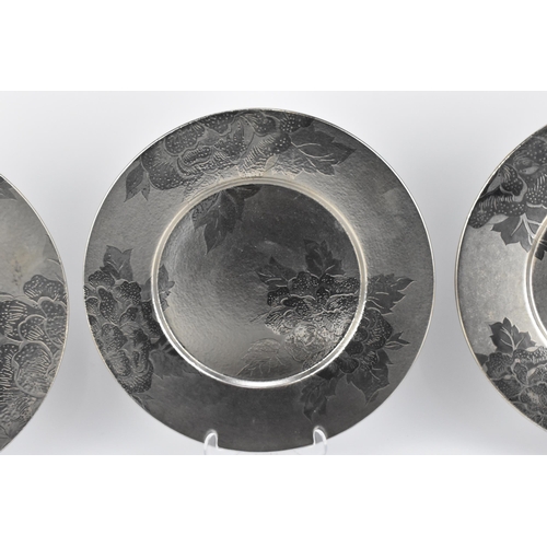 31 - A set of six Molin for Thomas Goode porcelain underplates, designed with silvered floral pattern, th... 