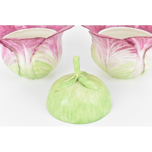 33 - A pair of studio ceramic trompe l'oeil cabbage pots, realistically rendered, with artist's monogram ... 