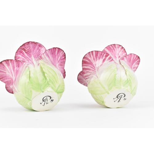 33 - A pair of studio ceramic trompe l'oeil cabbage pots, realistically rendered, with artist's monogram ... 