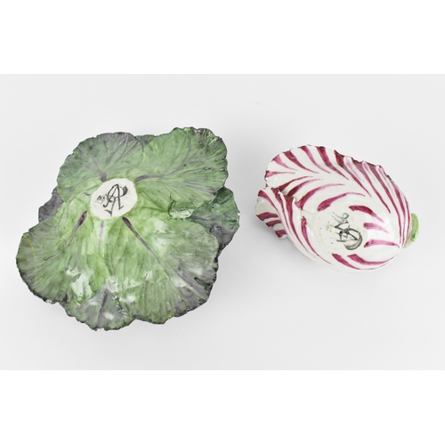 35 - Two studio ceramic trompe l'oeil vegetables, to include a green cabbage and a chicory, both by the s... 