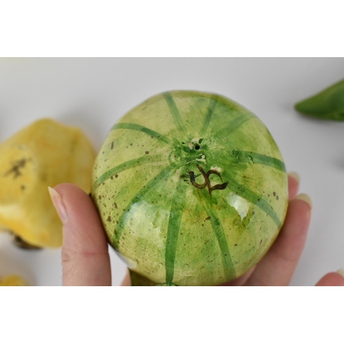 36 - A small collection of studio ceramic trompe l'oeil vegetables, comprising an apple and lemon as lidd... 