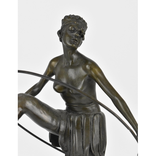 39 - After Dominic Alonzo: a large Art Deco style bronze figure of a hoop girl, with cast signature 'D. A... 