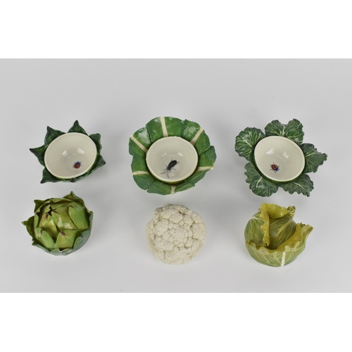 55 - A collection of three studio ceramic trompe l'oeil vegetable pots, each realistically rendered, comp... 