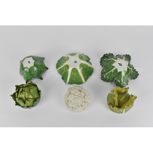 55 - A collection of three studio ceramic trompe l'oeil vegetable pots, each realistically rendered, comp... 